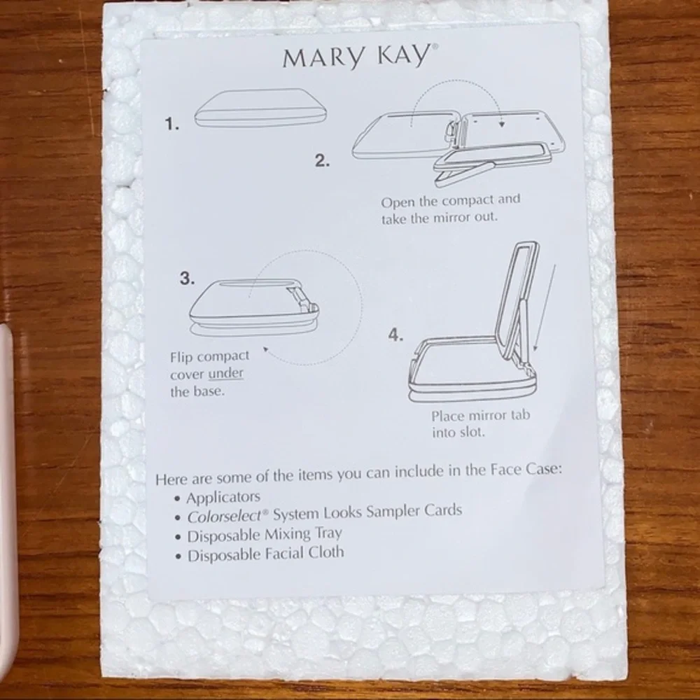 Mary Kay pink plastic compact travel mirror.